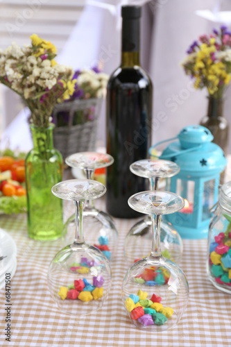 Buffet table with dishware waiting for guests