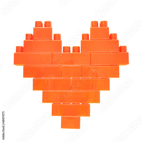 Heart symbol made of toy bricks
