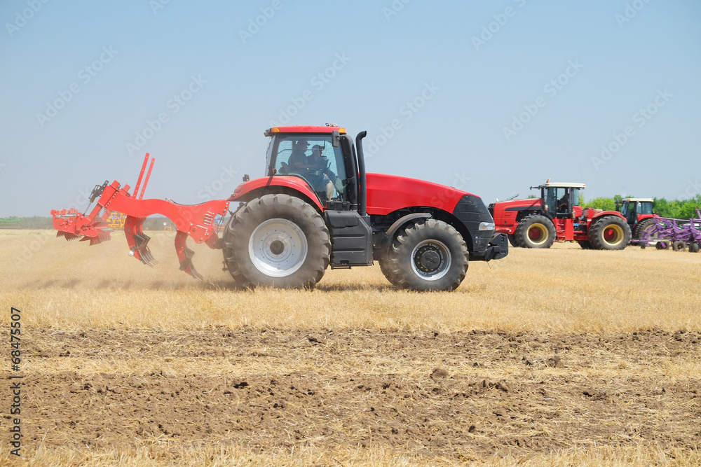 tractor with a plow tractor with a plow