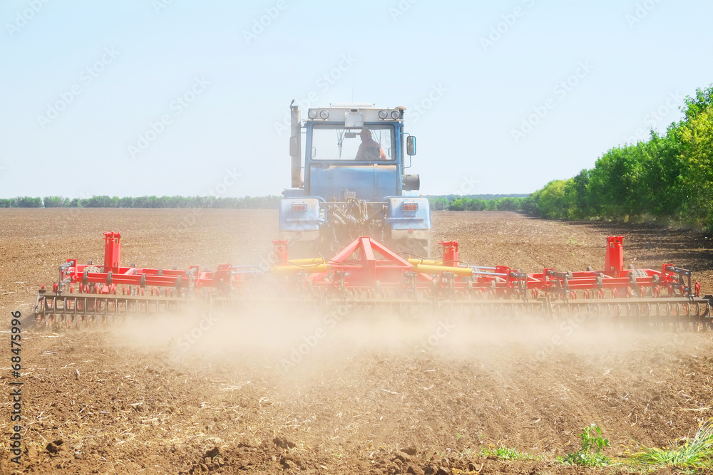 Obraz premium tractor with a plow