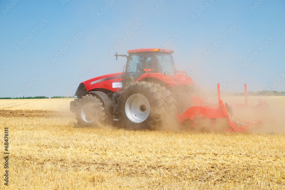 tractor with a plow tractor with a plow