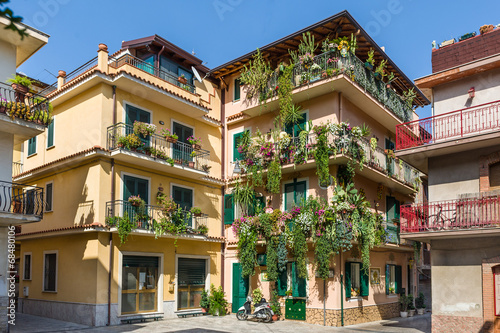 Traditional Sicilian houses decorated by flowers