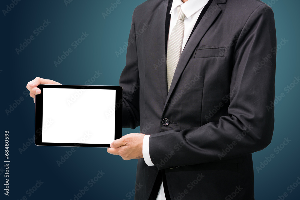 Businessman standing posture hand holding blank tablet isolated Businessman standing posture hand holding blank tablet isolated