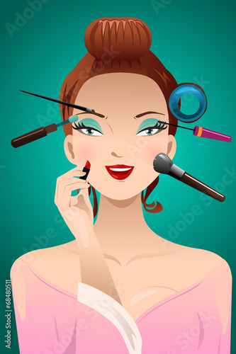 Applying makeup on a woman head