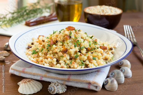 Fregola con bottarga, cucina sarda photo