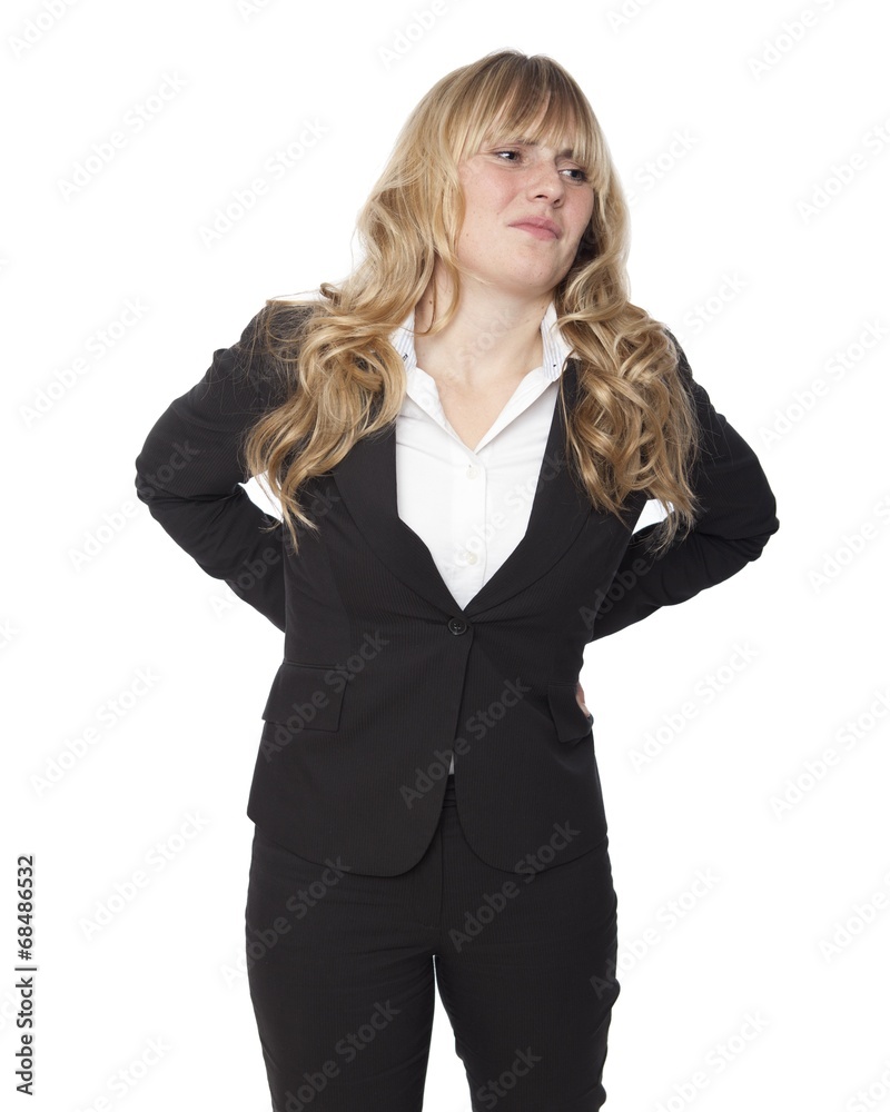 Young businesswoman with a sore back Young businesswoman with a sore back