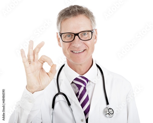 Smiling happy doctor giving a perfect gesture