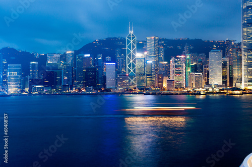 Hong Kong  night over Victoria Harbor with clear sky © zhangyang135769