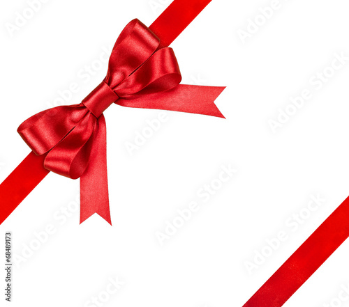 composition with red ribbons and a bow isolated on white