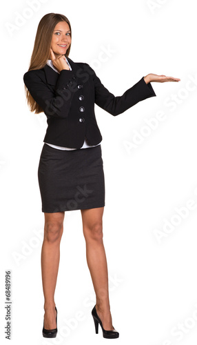 Принти на полотні Businesswoman holding anything