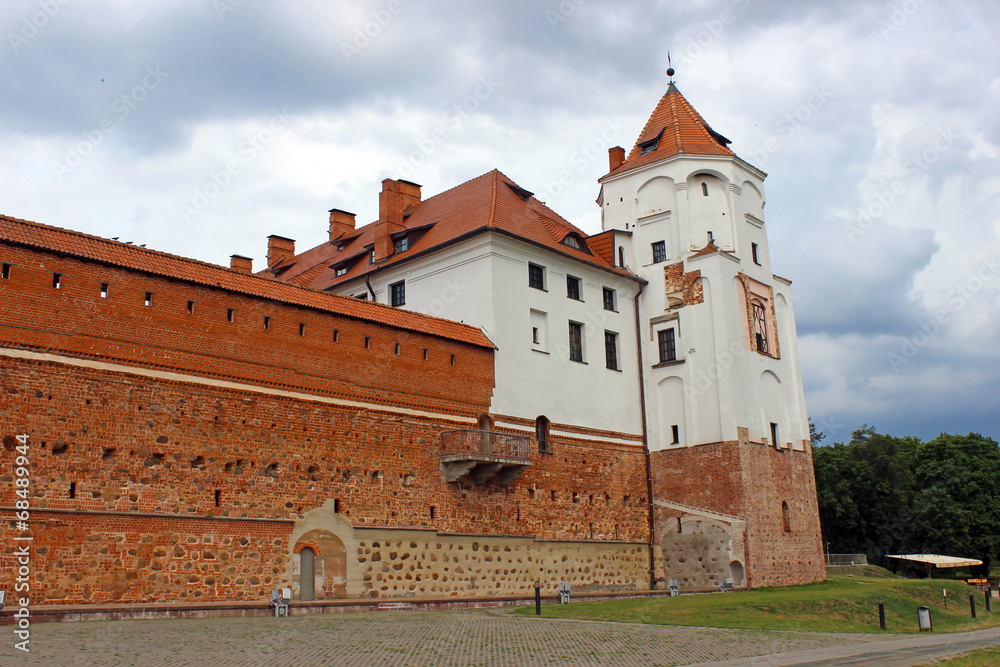 Mir Castle on the background of a stormy sky