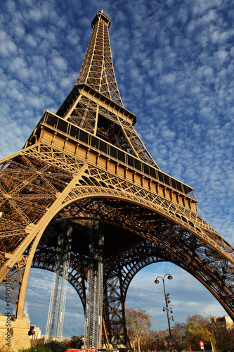 Eiffel Tower in Paris on the winter with the white clouds