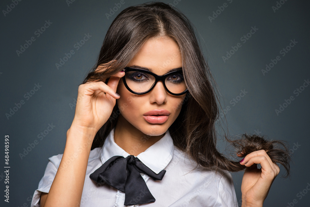 Beautiful sexy brunette young business woman wearing glasses foto de Stock  | Adobe Stock