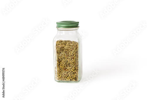 dried rosemary in glass jar isolated on white background with sh