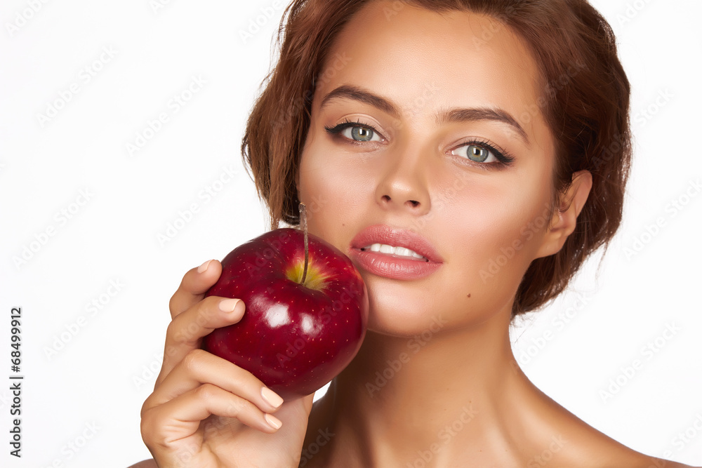 Young beautiful sexy woman holding big red apple to enjoy taste Young beautiful sexy woman holding big red apple to enjoy taste