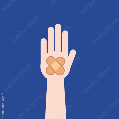 Hand with bandage and blue background