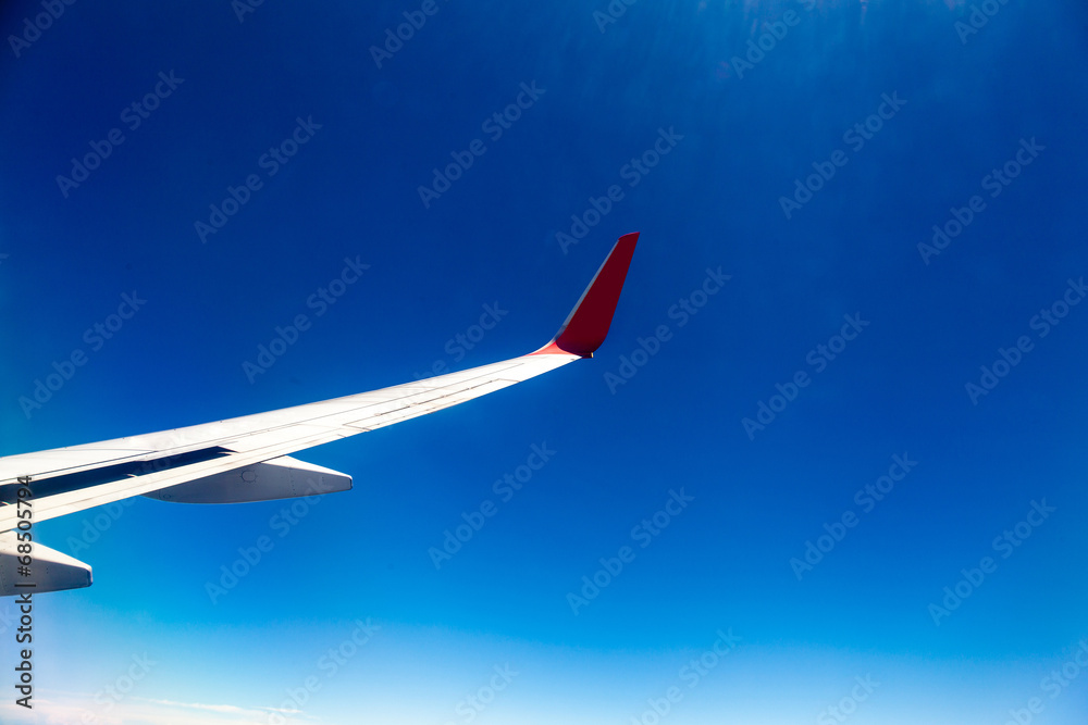 Classic image through aircraft window onto jet engine Classic image through aircraft window onto jet engine