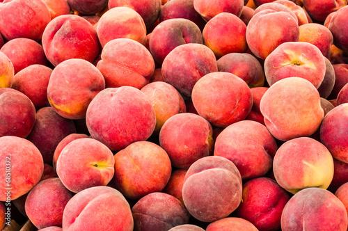 Fototapeta Fresh picked peaches on display
