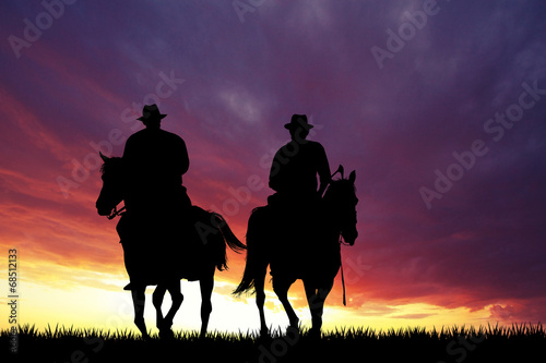 cowboys at sunset © adrenalinapura