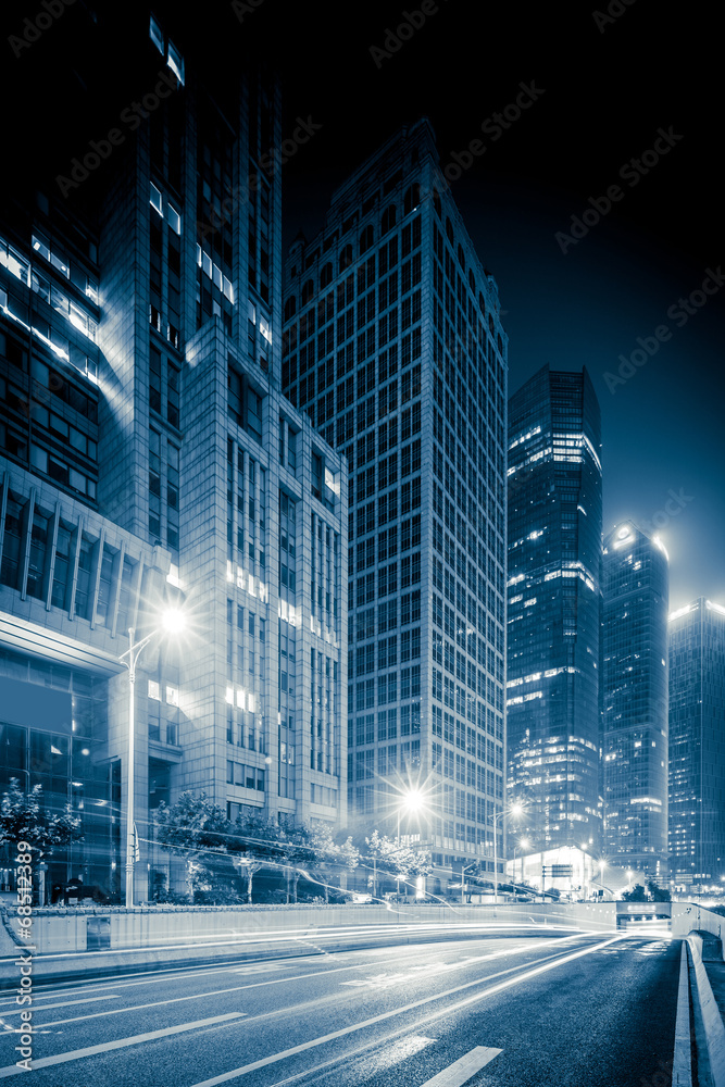 light trails on the modern building background in shanghai light trails on the modern building background in shanghai