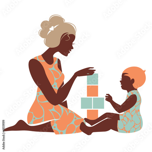 Beautiful silhouette  of mother and baby playing with toys