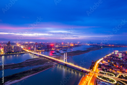 night view of the bridge and city in shanghai china.