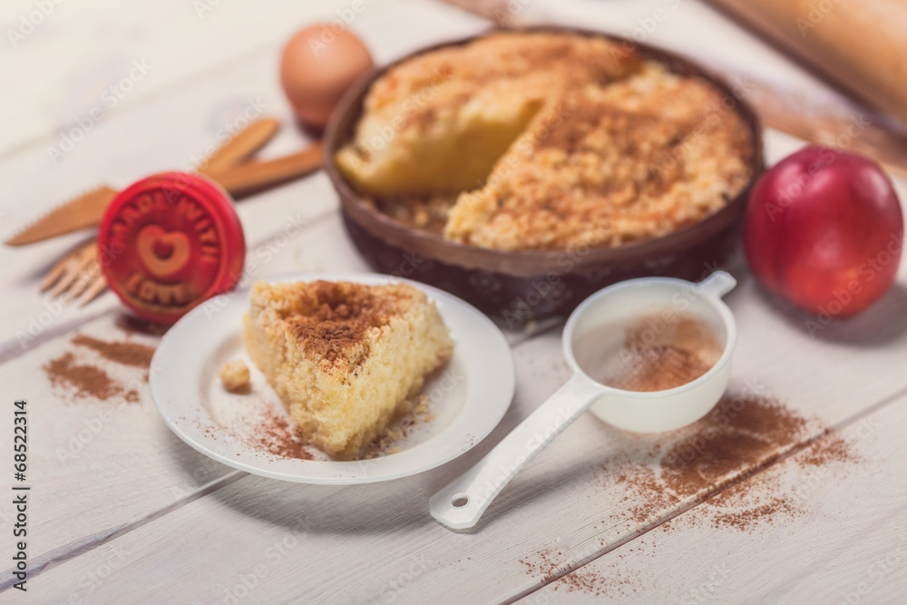 Pie apple with cinnamon on wooden planks Pie apple with cinnamon on wooden planks