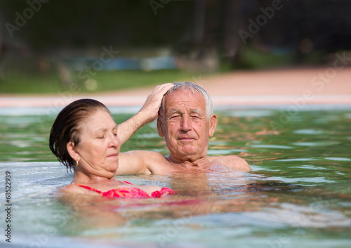 Couple in pool © Budimir Jevtic