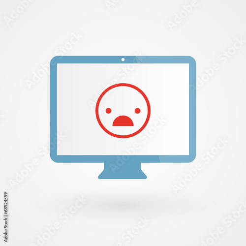 Desktop and unhappy smiley