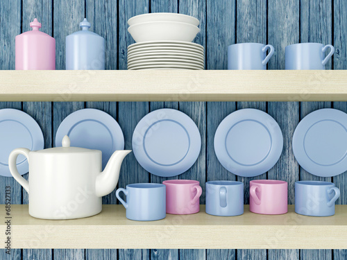 Ceramic kitchenware on the shelf.
