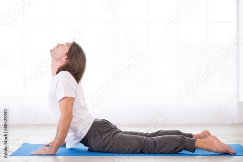 Yoga man in cobra pose