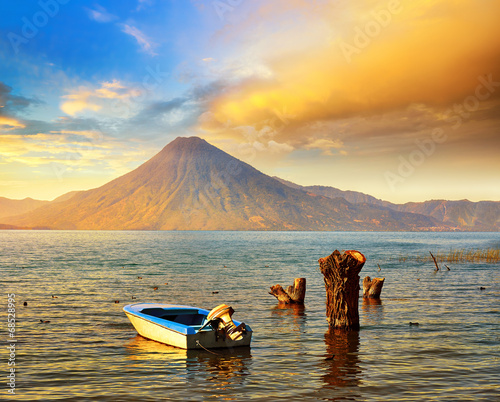Beatiful sunset at the lake Atitlan near the volcano. photo