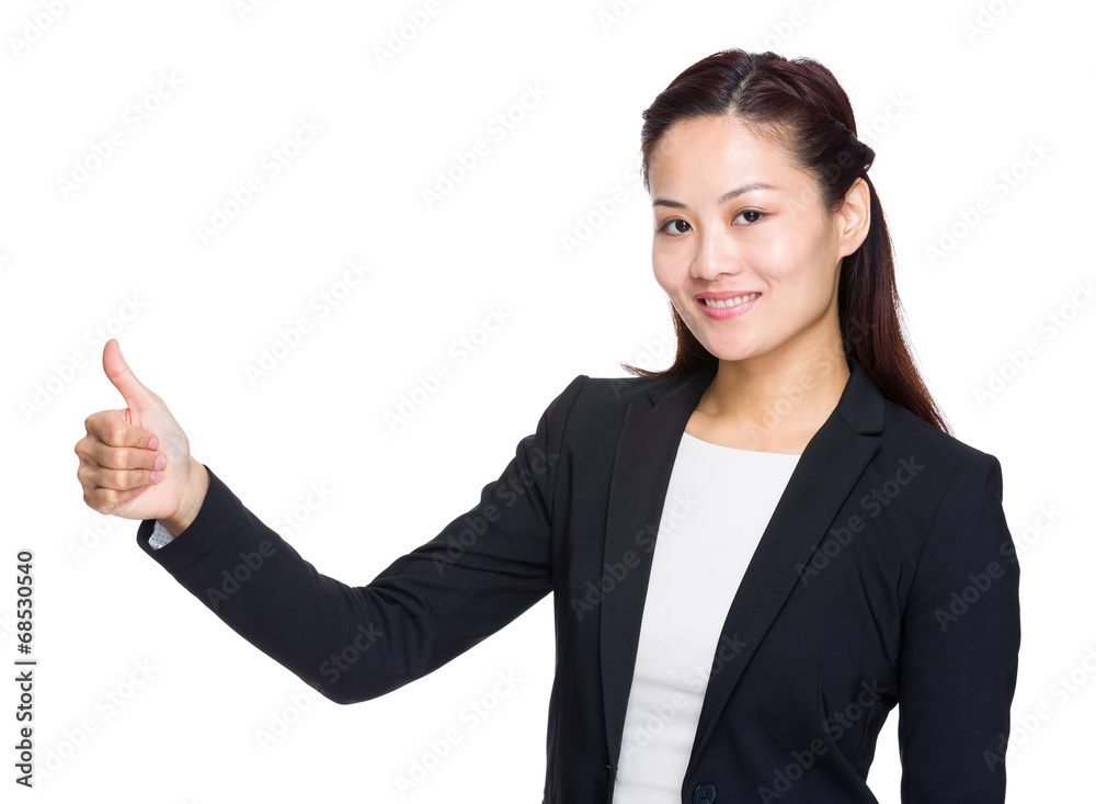 Senior businesswoman with thumb up