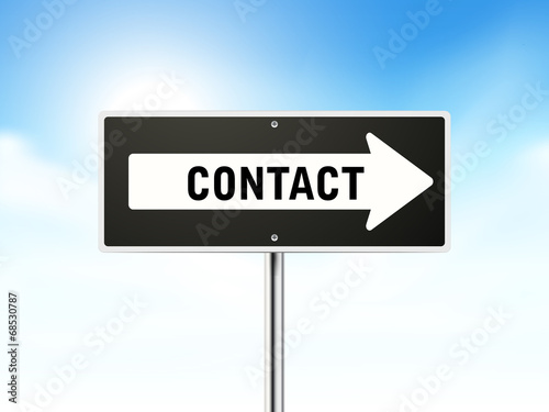 contact on black road sign