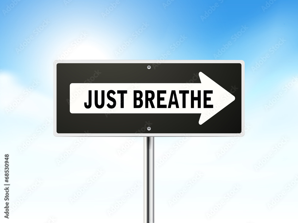just breathe on black road sign just breathe on black road sign