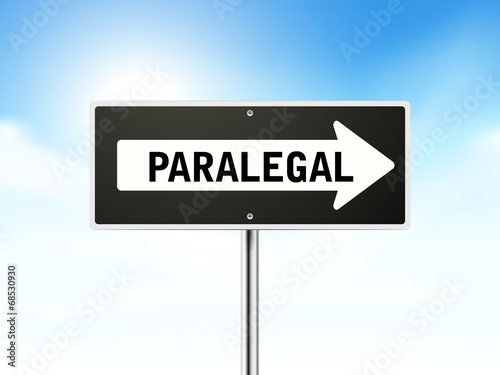 paralegal on black road sign