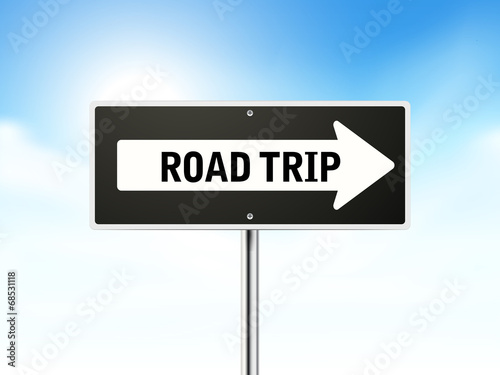 road trip on black road sign
