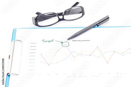 Blue clipboard, pen, glasses and business graph.