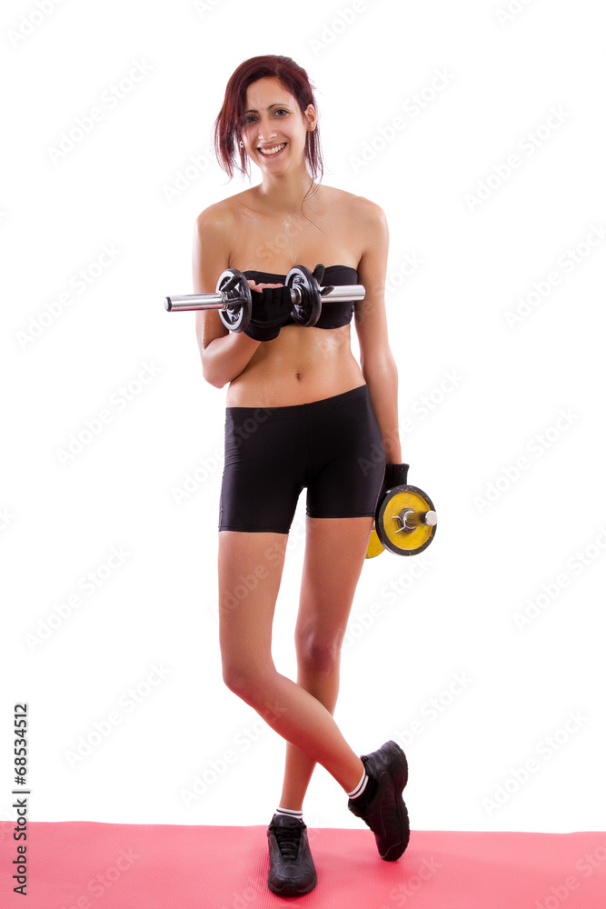 Beautiful healthy young girl with a dumbbell Beautiful healthy young girl with a dumbbell