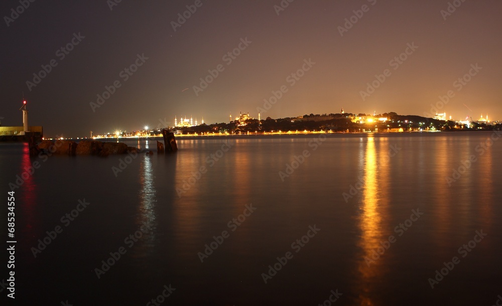 Istanbul historical peninsula night view, the lights of the night reflect on the sea