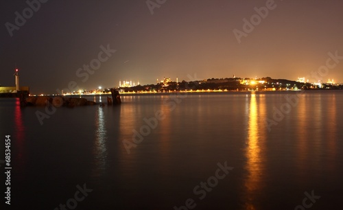 Istanbul historical peninsula night view, the lights of the night reflect on the sea