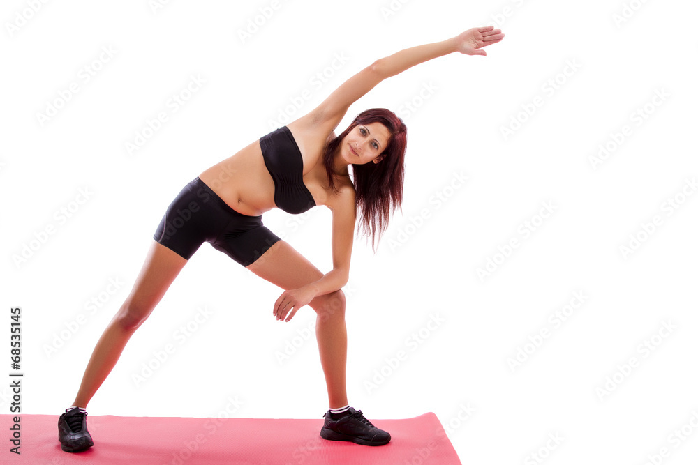 Fototapeta premium Beautiful healthy young girl with gym clothes