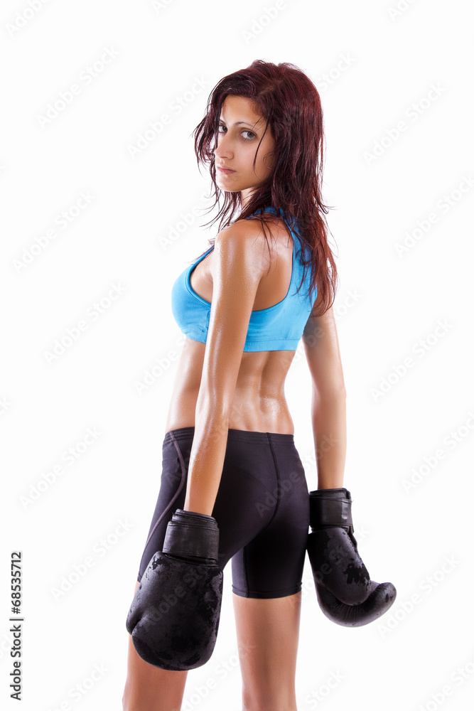 Beautiful healthy young girl with boxing gloves Beautiful healthy young girl with boxing gloves