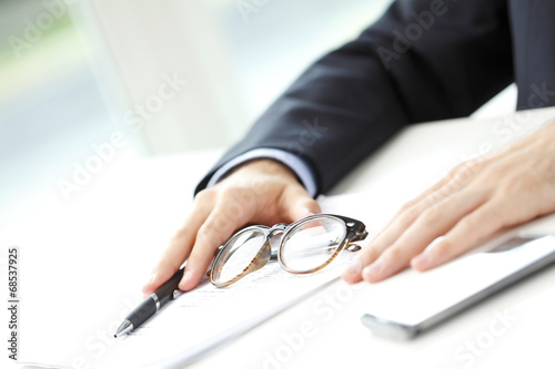 Close-up of businessman fill the form