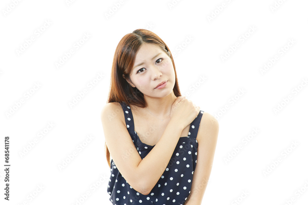 肩痛を訴える女性 肩痛を訴える女性