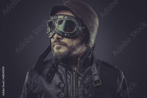 Wall Mural ww2 pilot dressed in vintage style leather cap and goggles