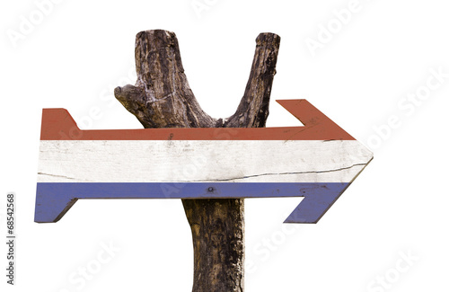 Netherlands wooden sign isolated on white background photo