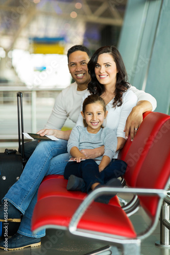 young family waiting for flight © michaeljung