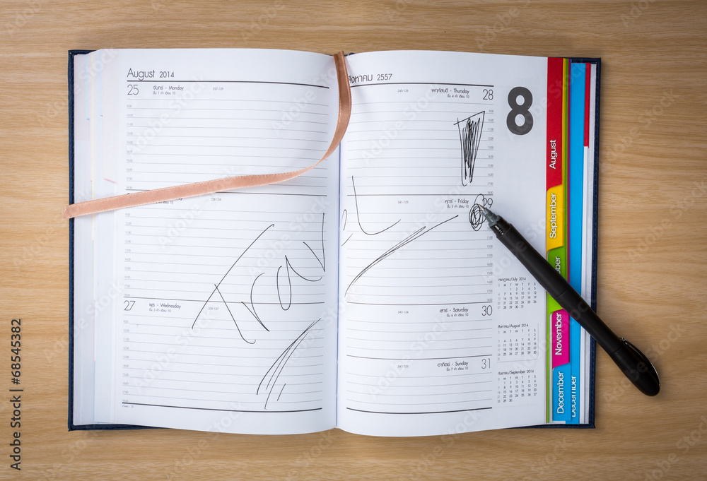 Note Book on Wooden Table with word Note Book on Wooden Table with word