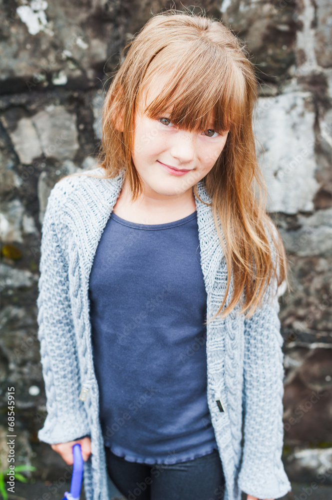 Outdoor portrait of adorable little girl in a city Outdoor portrait of adorable little girl in a city
